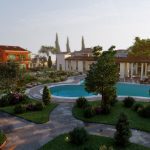 Six detached villas surrounding a communal swimming pool and landscaped garden in Turkey