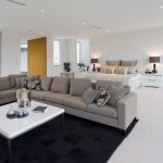 Spacious living room with modern furniture and natural light in a Turkish home