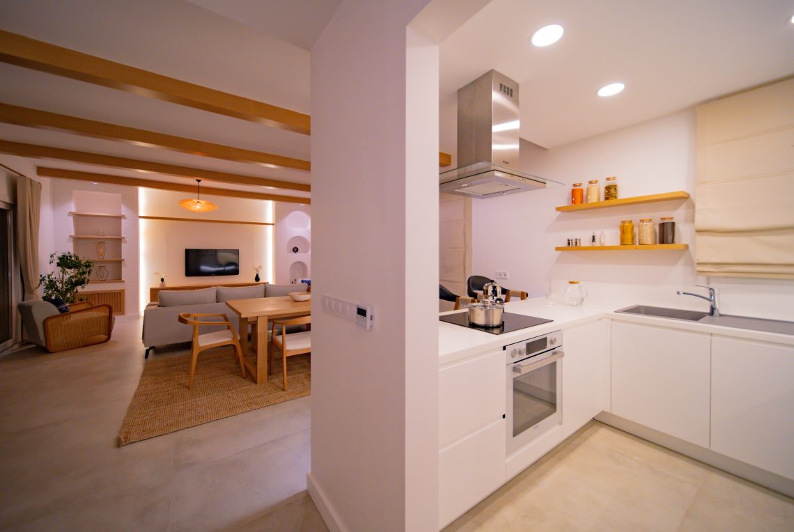 Modern kitchen with sleek cabinetry and built-in appliances