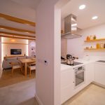 Modern kitchen with sleek cabinetry and built-in appliances